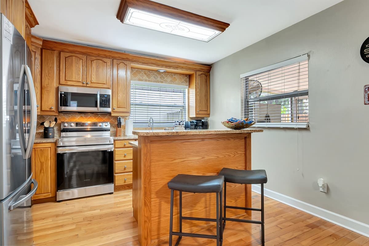 Nestled in a cozy corner, you'll find a charming breakfast table for two. 