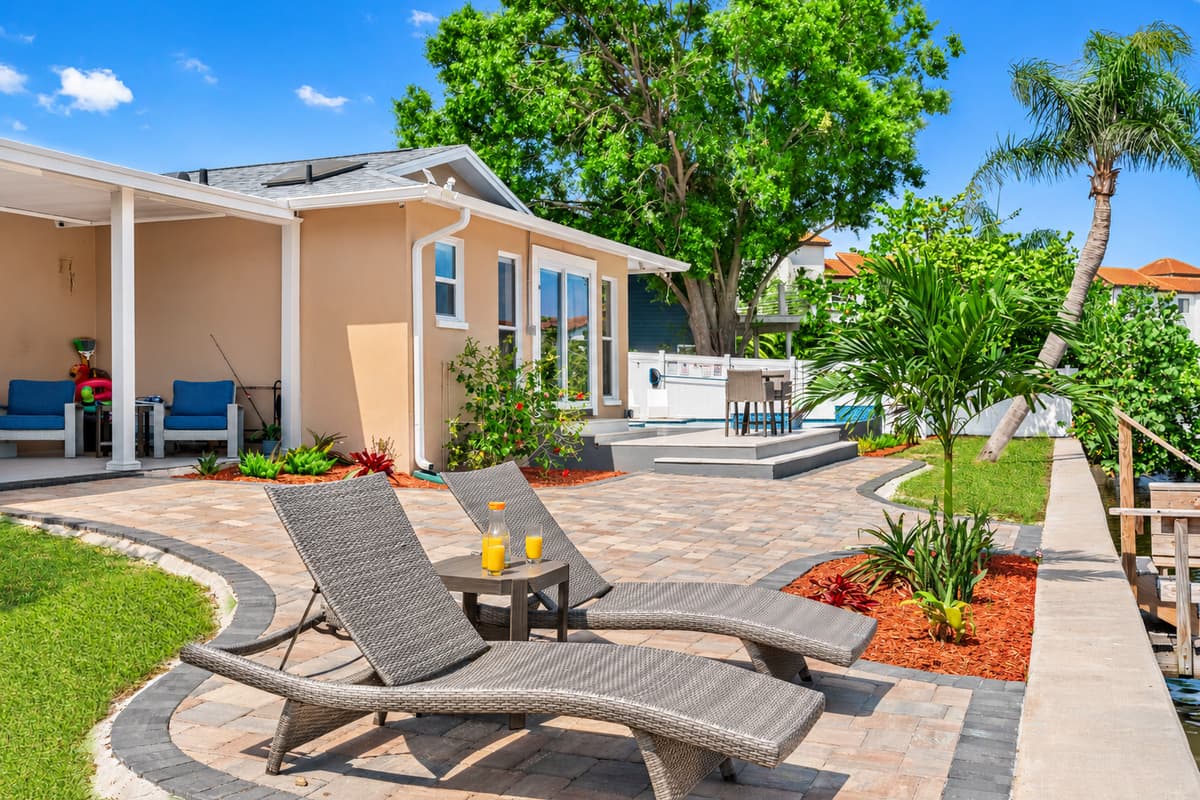 As day turns into night, the outdoor common area and patio transform into a magical oasis.