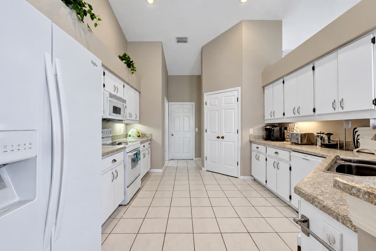 Whether you're preparing a feast for loved ones or simply indulging in a quiet meal for yourself, this kitchen embodies the perfect blend of functionality and beauty.