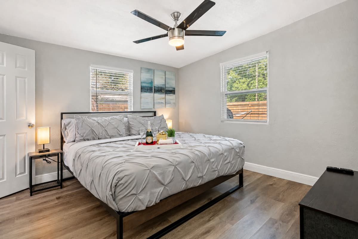 Welcome to the serene and elegant bedroom, where every detail has been carefully curated to ensure a peaceful and restful stay.