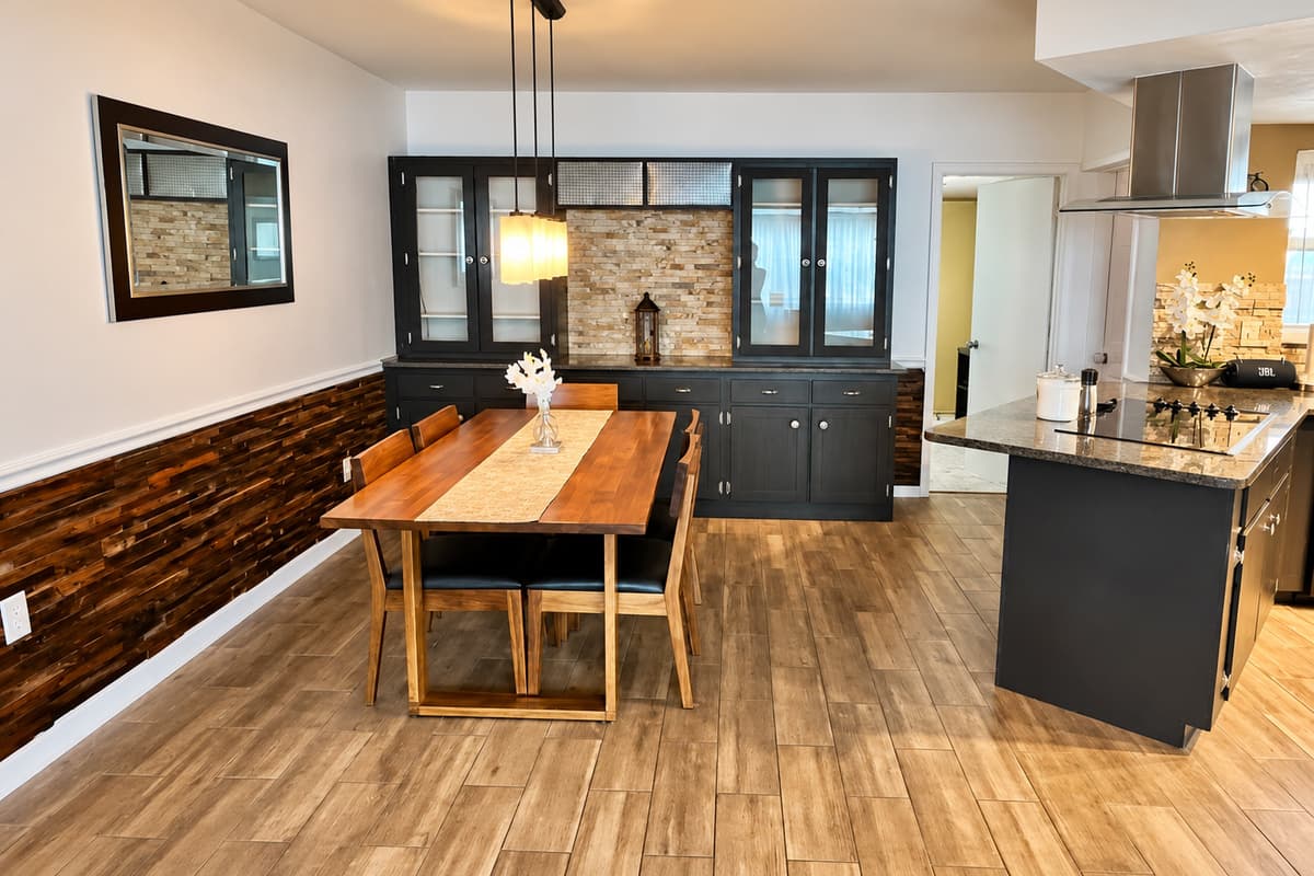 Enjoy meals together in this elegant dining space with built-in cabinetry.
