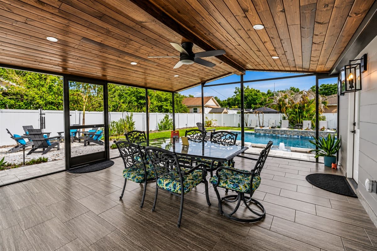 Spacious screened lanai designed for outdoor dining, lounging, and seamless indoor-outdoor living.