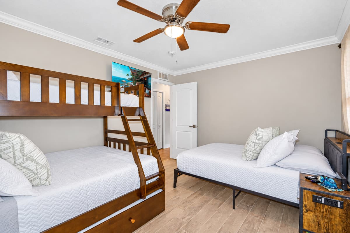 The room's decor is warm and welcoming, with gentle lighting and tasteful furnishings that create a cozy atmosphere.