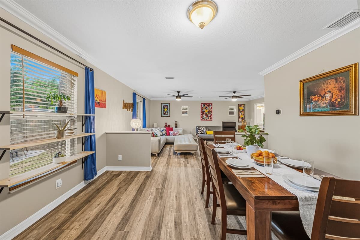 Spacious dining area with large table and natural light—perfect for group meals and gatherings.