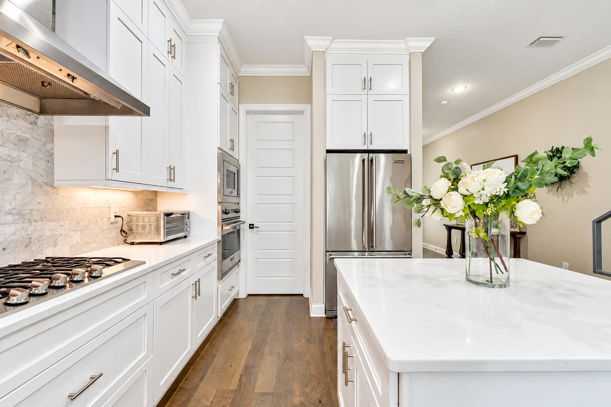 The combination of modern amenities, ample workspace, and thoughtful design elements ensures a seamless cooking experience that caters to all your needs.