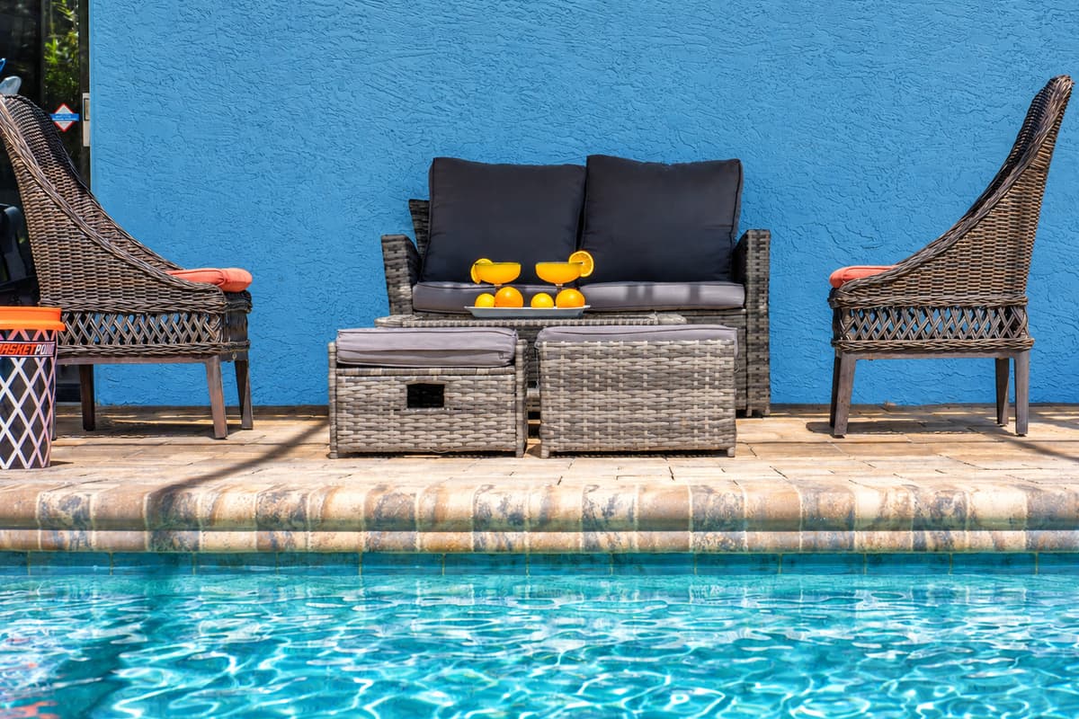 Whether you're floating in the pool or sipping lemonade in the shade, this fully enclosed backyard is designed for both relaxation and entertainment.