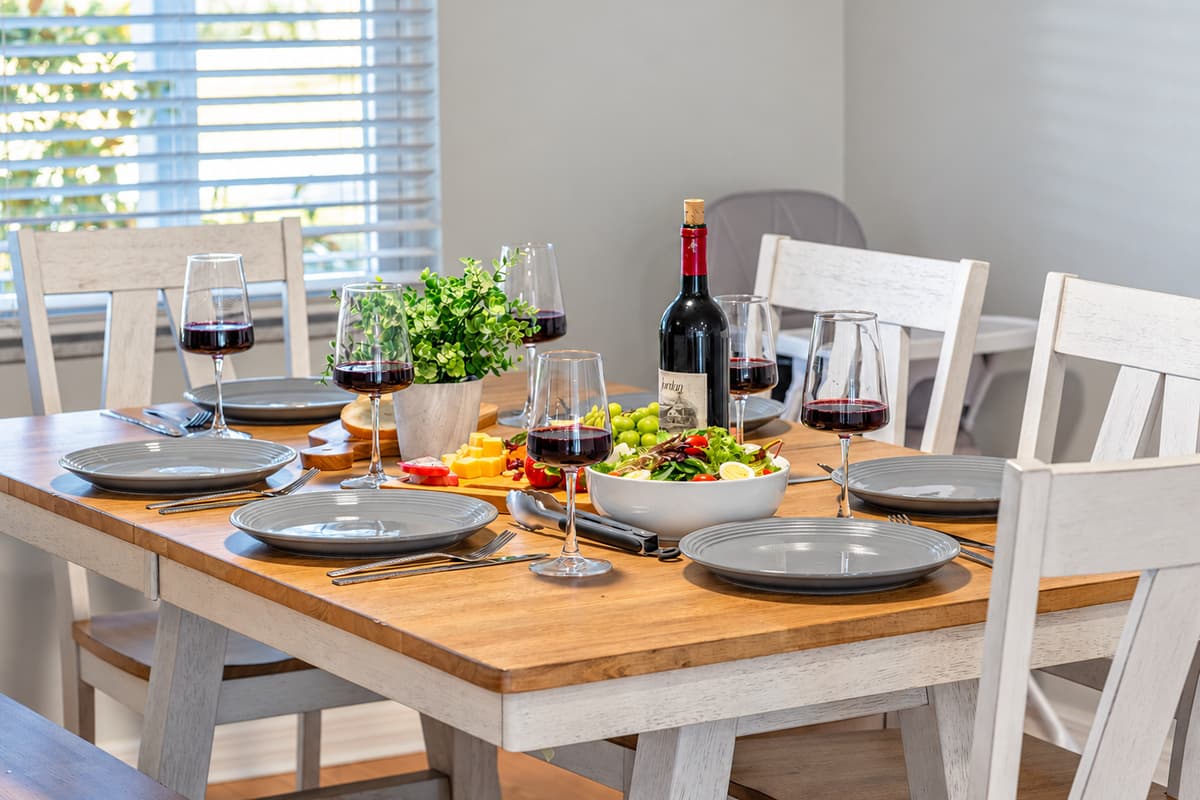 Perfectly positioned for convenience, enjoy meals just steps away from the kitchen and comfy living space.