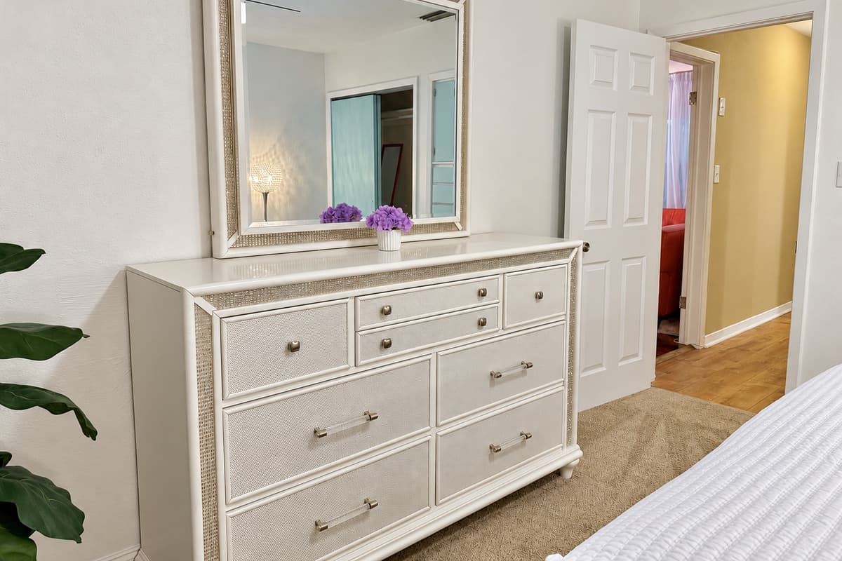 This bedroom offers the perfect balance of chic design and serene comfort—ideal for restful nights after sunny Florida days.