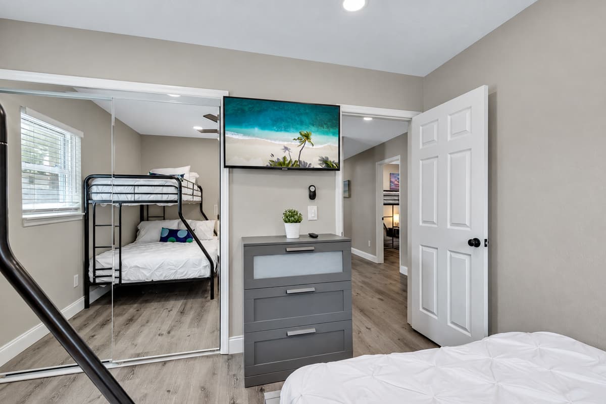Our wonderful bedroom with a comfortable huge bed, and a bunk bed. This room also has its own TV.  Feel at home in your home away from home. 