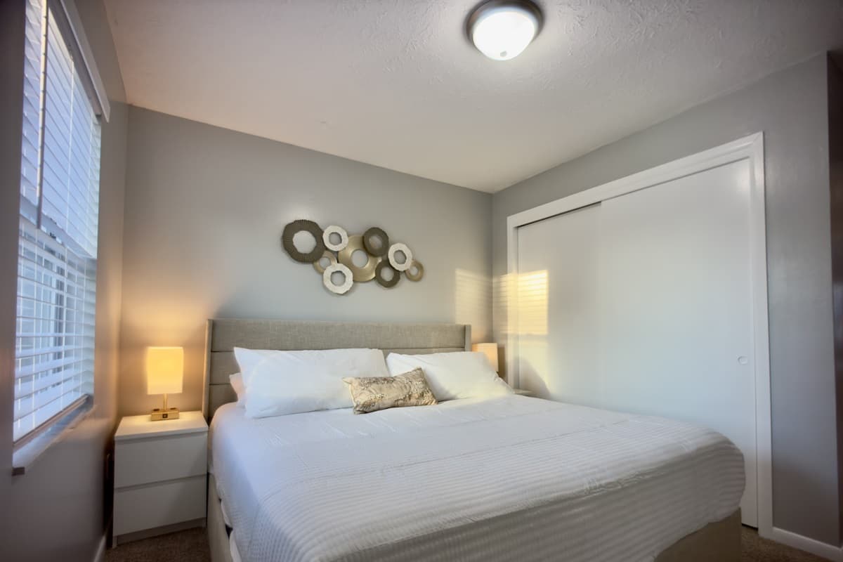 A warm and welcoming room with a queen-size bed, perfect for unwinding after a long day.