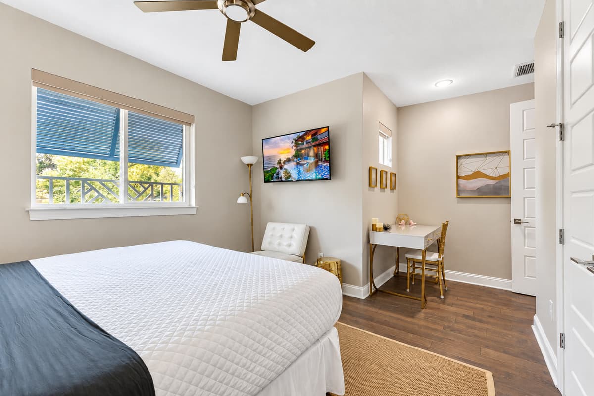 The decor of the bedroom exudes a sophisticated charm, with carefully selected furnishings and tasteful accents that enhance the room's tranquil atmosphere.