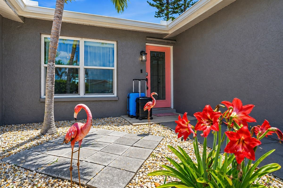 Inviting front entry with tropical accents and unique decorative touches.