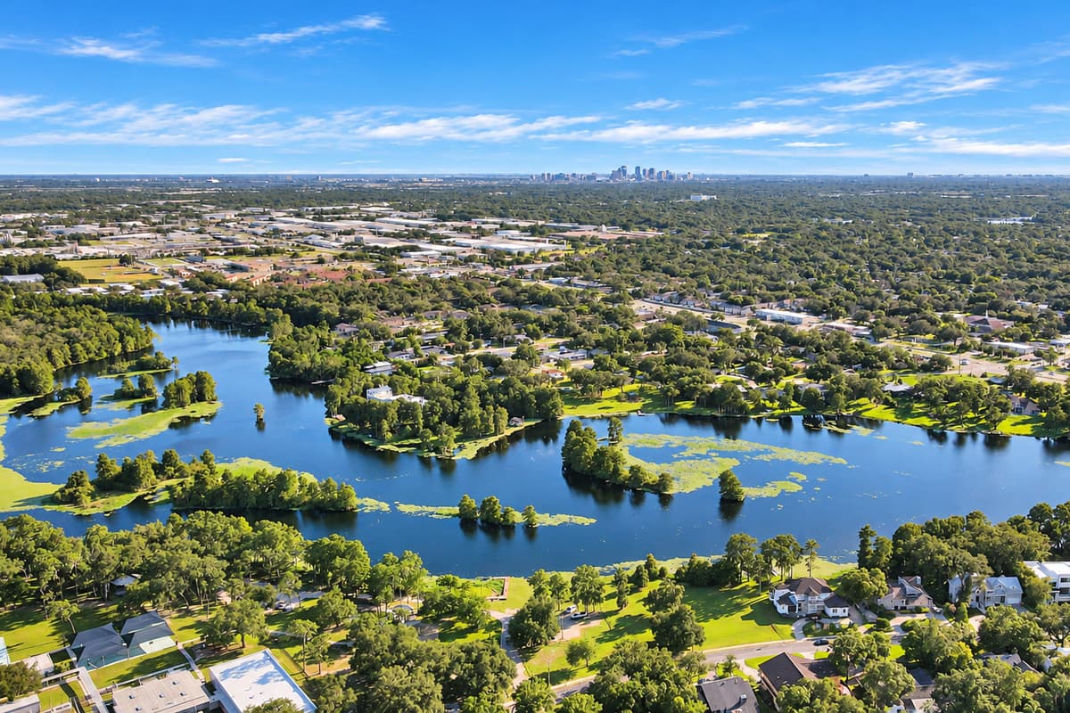 Lakes, oaks and Tampa on the horizon. The neighborhood from the air: water, green space and the city skyline in the distance, twenty minutes down the road.
