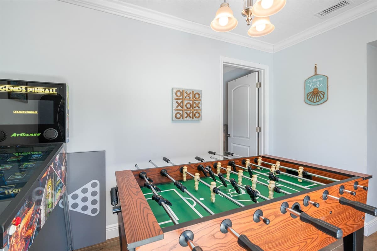 The game room is equipped with a variety of entertainment options to suit all ages and interests, ensuring that everyone has a great time.