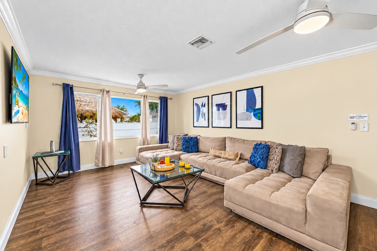 Gather together in the cozy living room with ample seating for the whole group.
