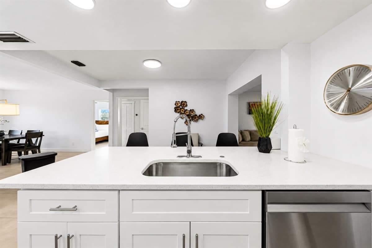 Spacious kitchen with oversized countertops, modern finishes, and ample prep space.