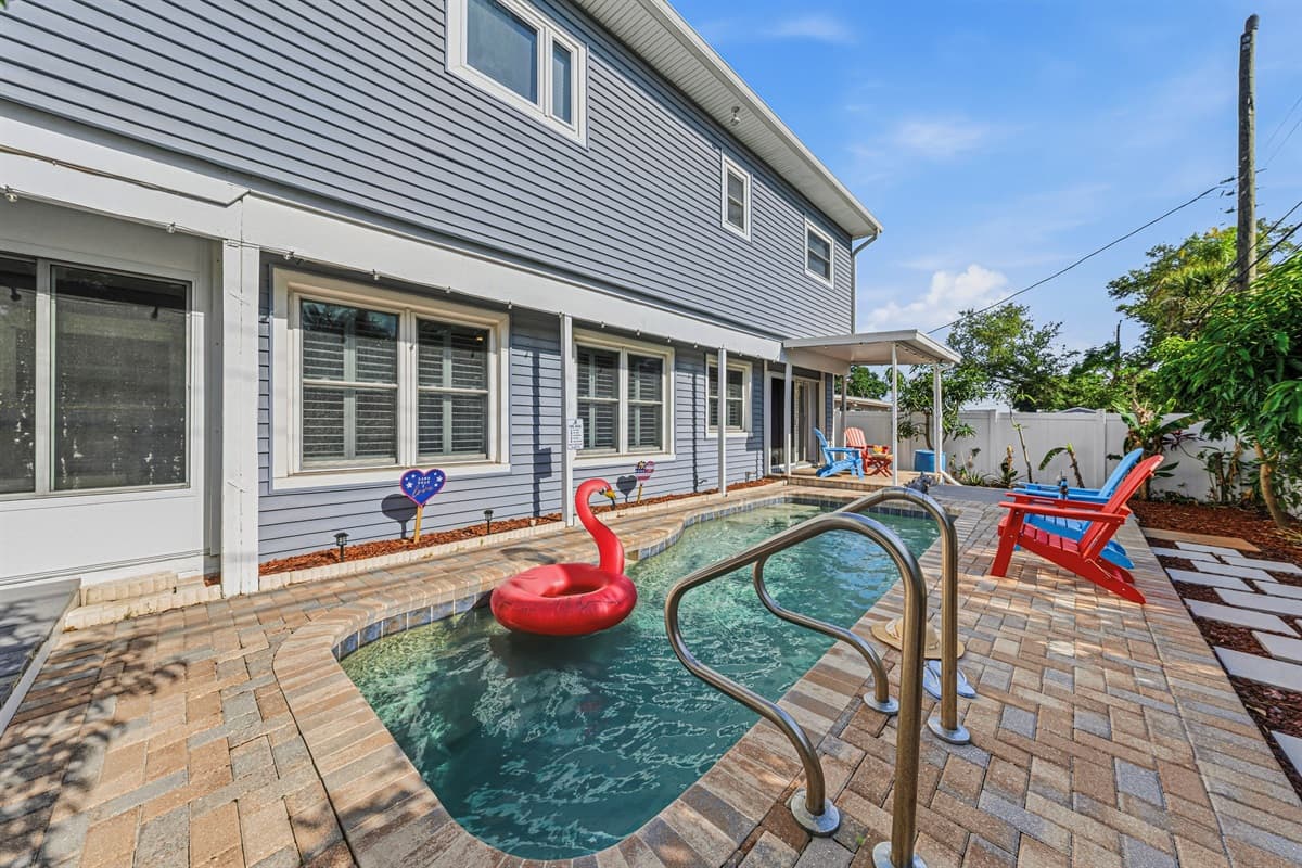 Private pool with surrounding patio and lounge chairs—perfect for cooling off on warm days 