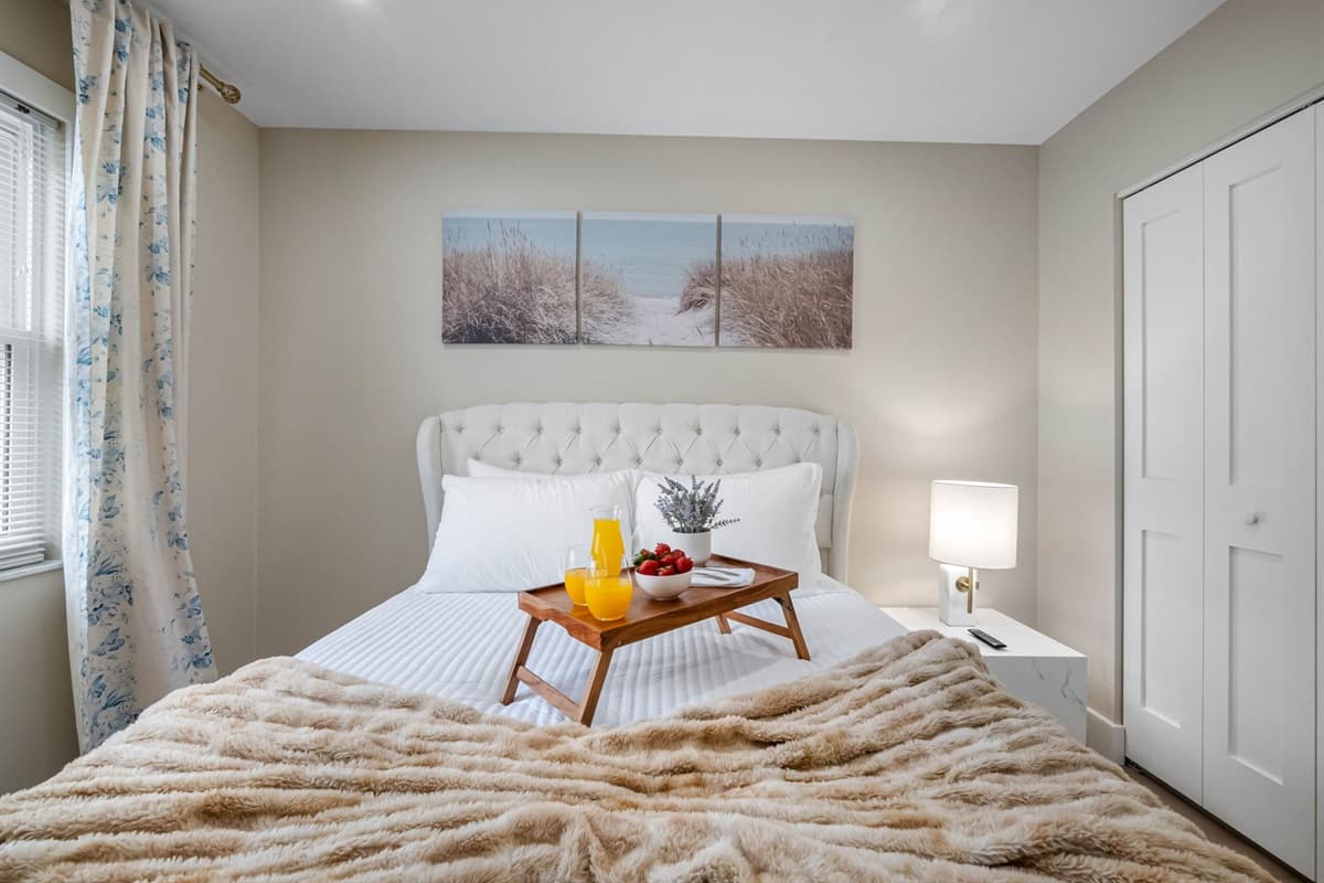 This elegant queen room combines modern style with cozy comfort, creating the ultimate restful retreat.