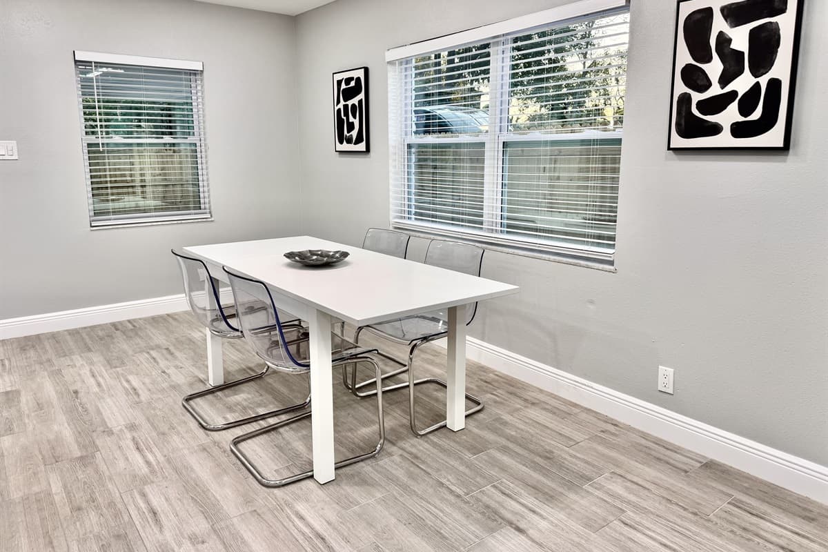 Adjacent to the kitchen is the dining area, a cozy yet stylish space designed to bring everyone together over meals.