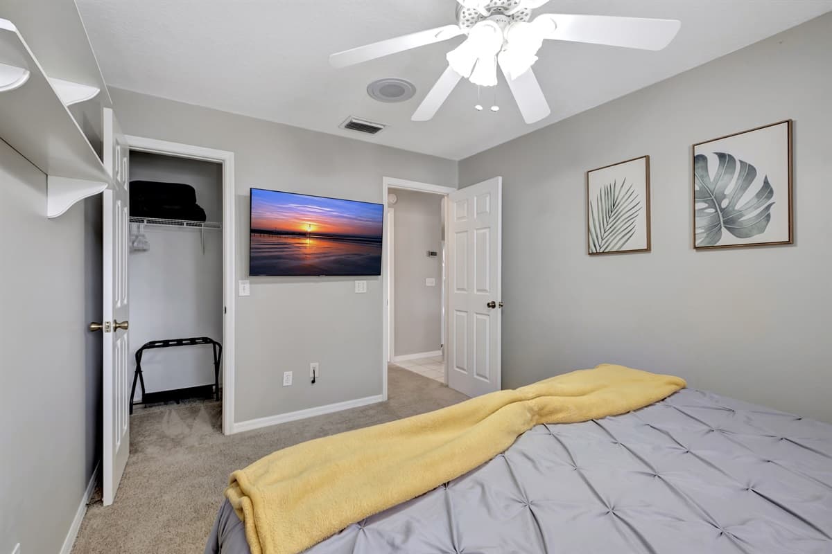 Cool breezes caress the room as a ceiling fan gently stirs the air, creating a soothing ambiance that lulls you into a state of pure tranquility.