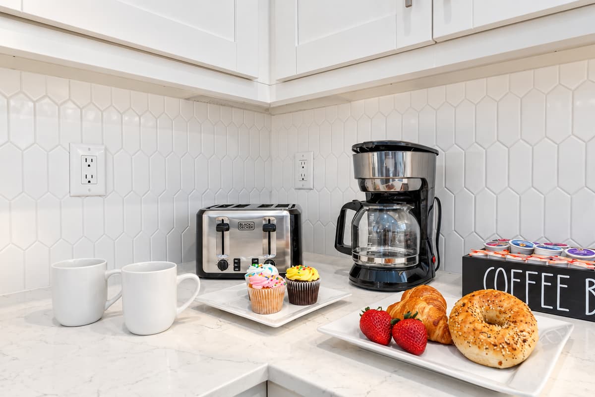 Coffee station with essentials and treats—perfect for starting your day.