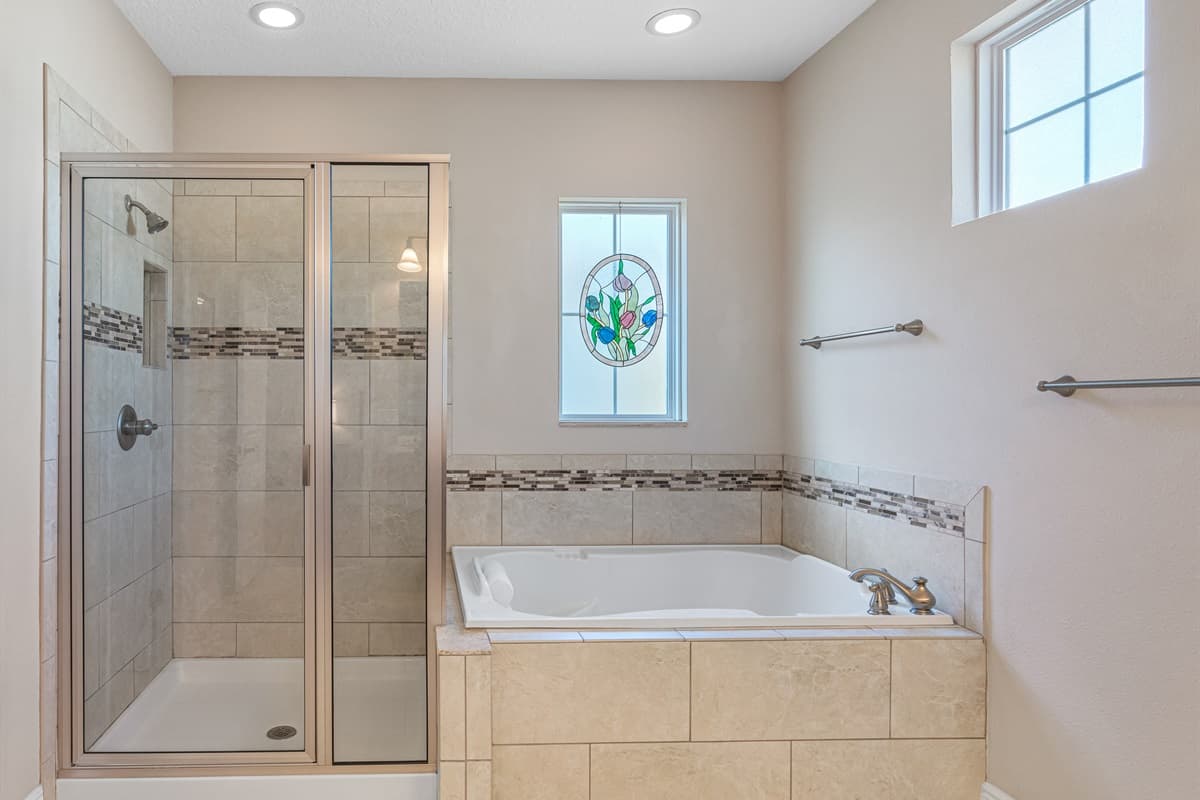 Completely modern and spacious bathroom with a jetted bathtub, sink, toilet, and walk-in shower. Enjoy a relaxing bath after a long day of travel from your home to your home away from home. If you like this property, send us a message now!