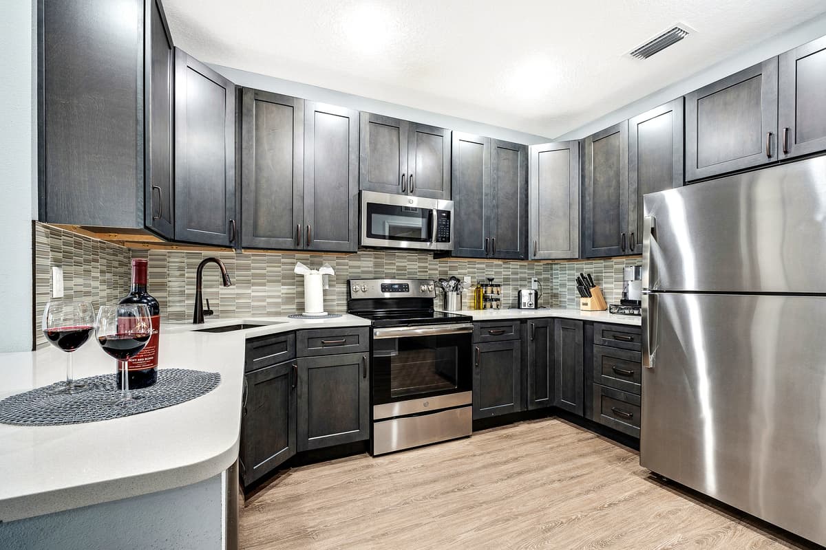 Designed with both aesthetics and practicality in mind, this kitchen invites you to explore the art of cooking with ease.