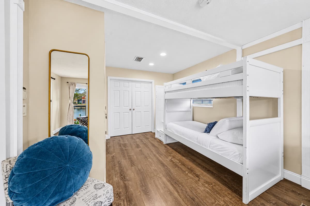 Spacious sleeping area with bunk beds, modern furnishings, and plenty of room to unwind.