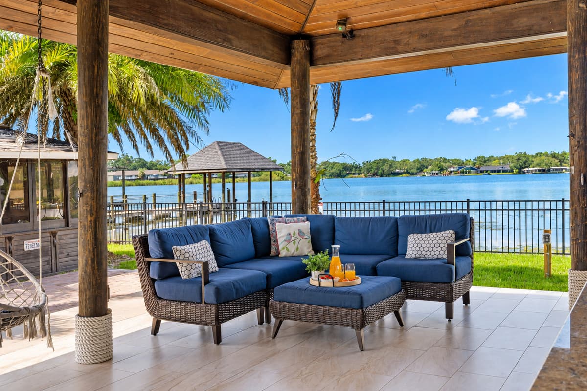 The picturesque lakefront setting offers an atmosphere of pure tranquility and natural beauty.