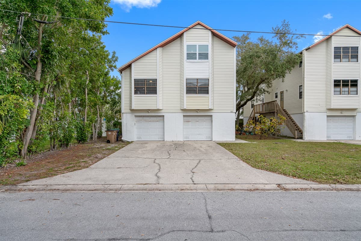 The exterior exudes an inviting warmth, reflecting the essence of a home that embraces both style and comfort.