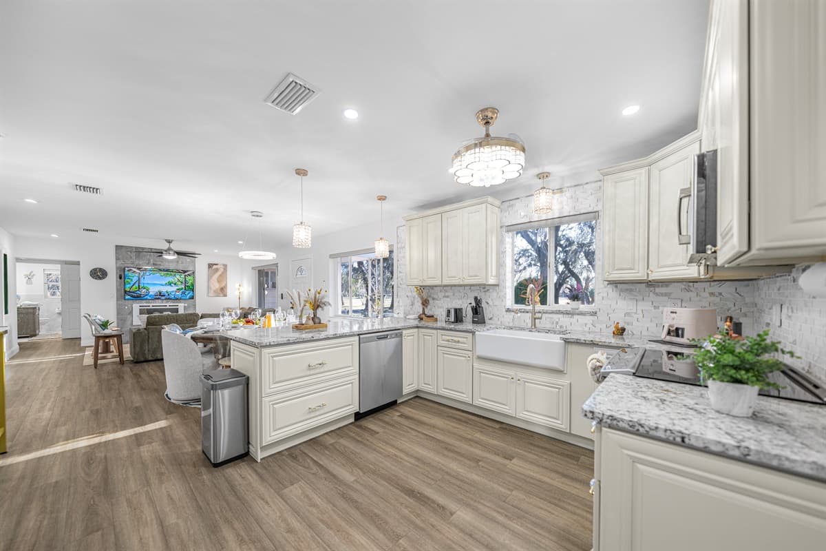 Designed for both beauty and function, this kitchen offers plenty of space to prepare meals while staying connected to the rest of the home.