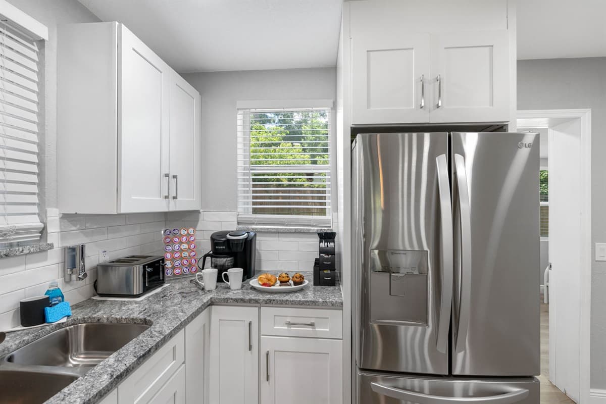 The kitchen is equipped with state-of-the-art appliances that make cooking a breeze.