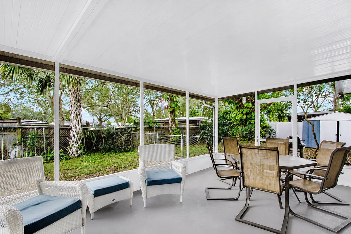 Our covered patio is a haven for all seasons, providing a stylish escape with beautiful seating arrangements that redefine comfort.