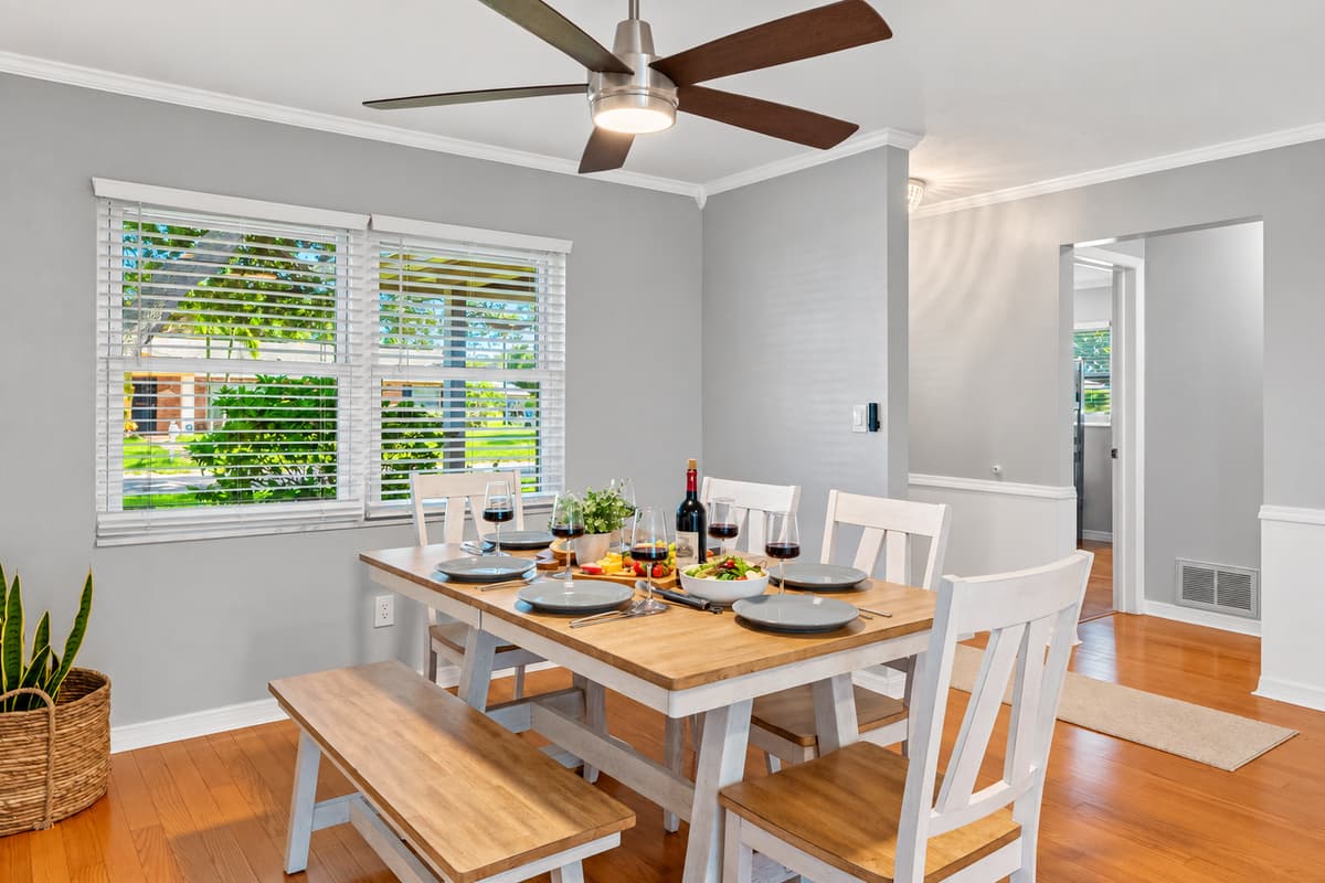 Open-concept charm—this dining space keeps everyone connected whether you're cooking, lounging, or eating.