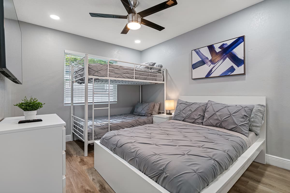 Perfect room for families with kids or group of friends. This magnificent bedroom with twin sized bed, single bunkbed, drawers for storage and smart TV. If you feel like this place is for you, send us an inquiry now!