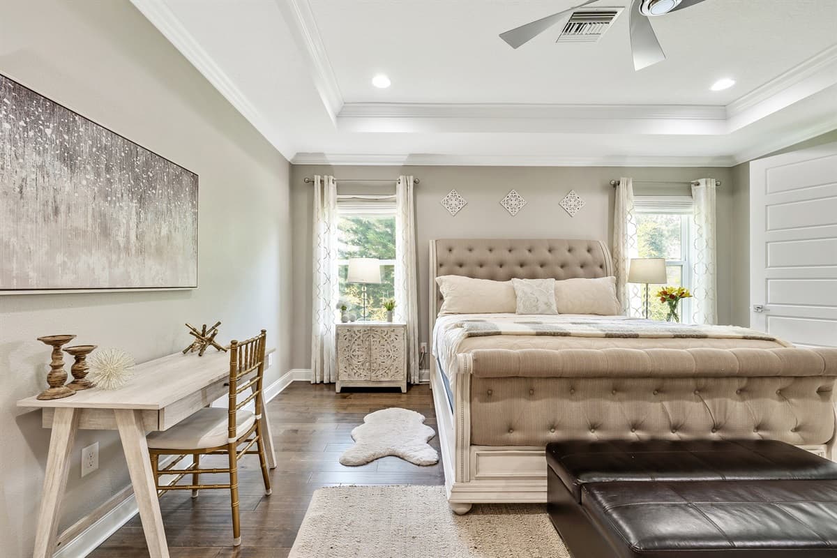 The king-size bed takes center stage in this bedroom, offering a comfortable haven where guests can sink into a state of relaxation.