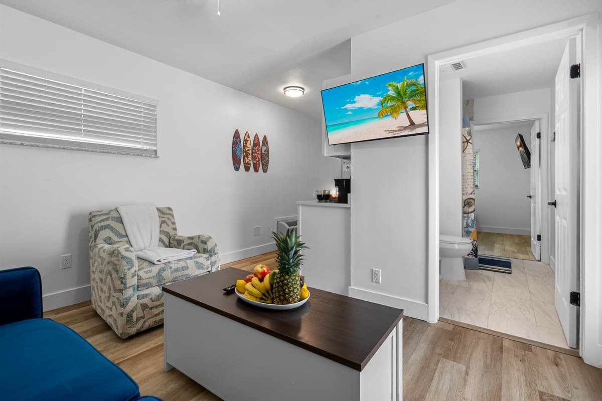Your peaceful retreat awaits! This cozy suite features its own living space, sleeping nook, and kitchenette—all in a bright, modern design.