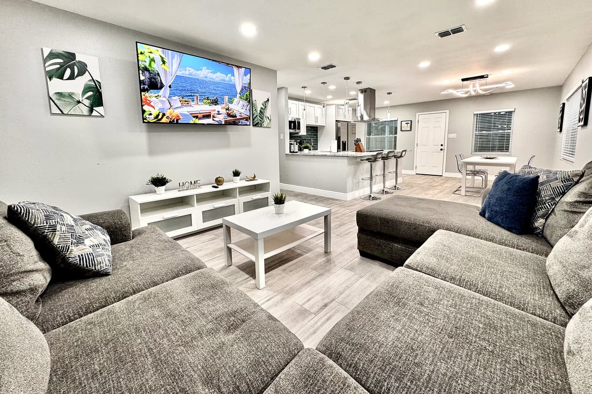 This spacious living room is thoughtfully designed to cater to your every need, whether you’re unwinding after a day of exploring Tampa, hosting a movie night, or simply enjoying quality time with loved ones.