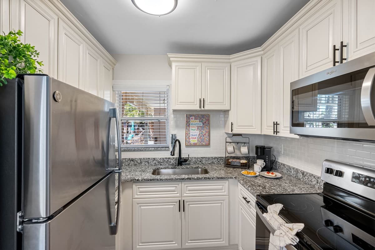Embark on a culinary adventure in the heart of Seaside Serenity's fully functional complete kitchen.
