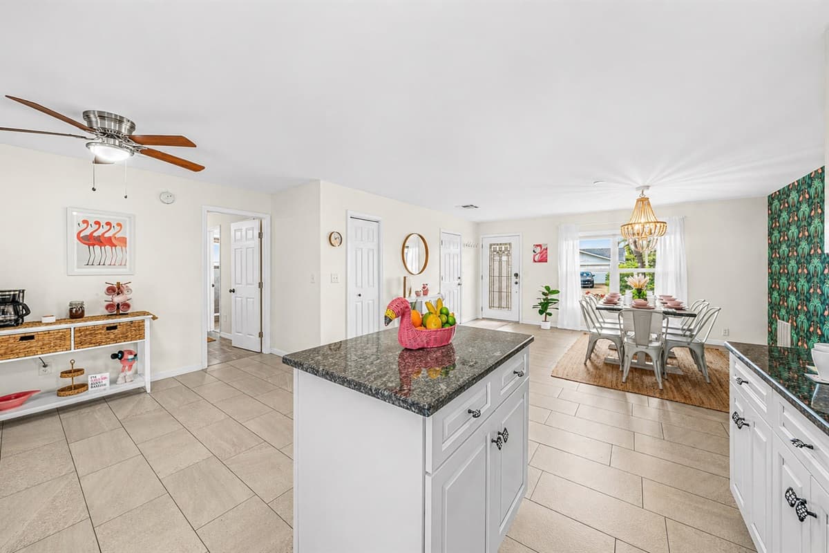 Open-concept kitchen flowing seamlessly into dining and living areas—great for entertaining.