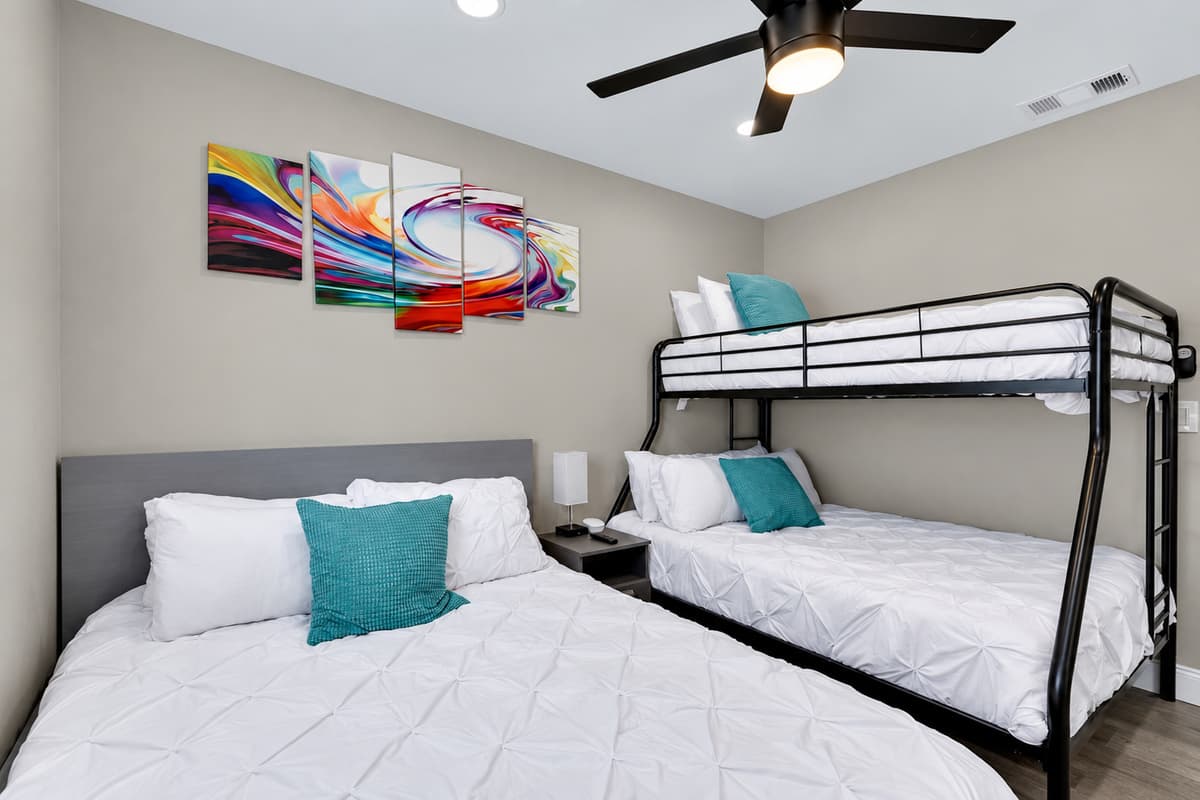 Friends are joining you for vacation? This amazing room is great for them! It has queen sized bed, single over twin bunkbed, great for sharing! Book now!