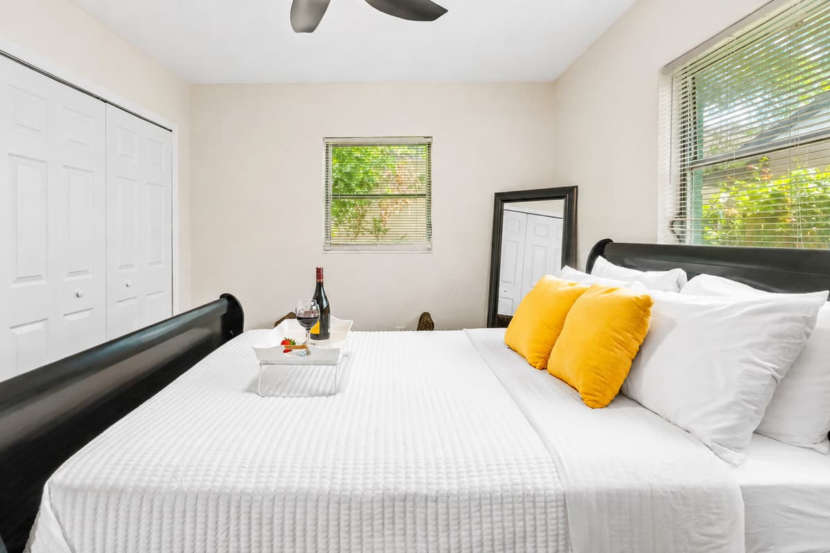 This cozy yet sophisticated bedroom offers the perfect balance of comfort, simplicity, and contemporary style.
