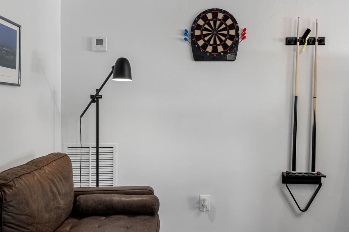 Bright, stylish, and fun-filled—this game room is the heart of the house for guests who love to play. With multiple activities and comfy seating, it’s perfect for unwinding or turning up the energy.