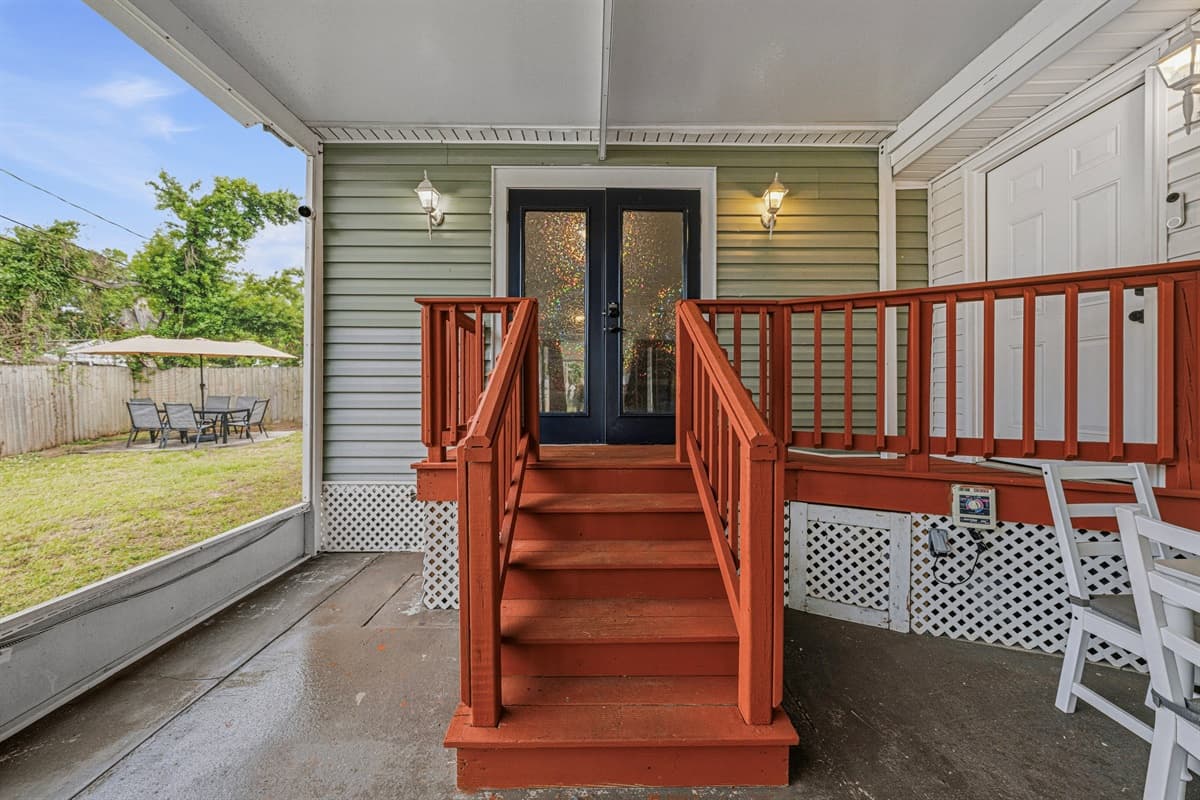 Backyard access with stairs leading to the patio—easy transition between outdoor spaces.
