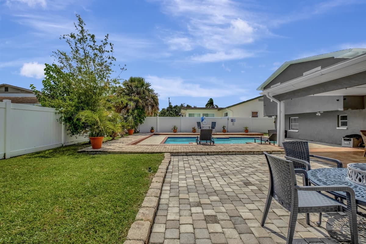 Amazing fully fenced backyard with heated pool, sitting area and griller. Enjoy good food while bonding with family and friends without worrying about the cold weather. 