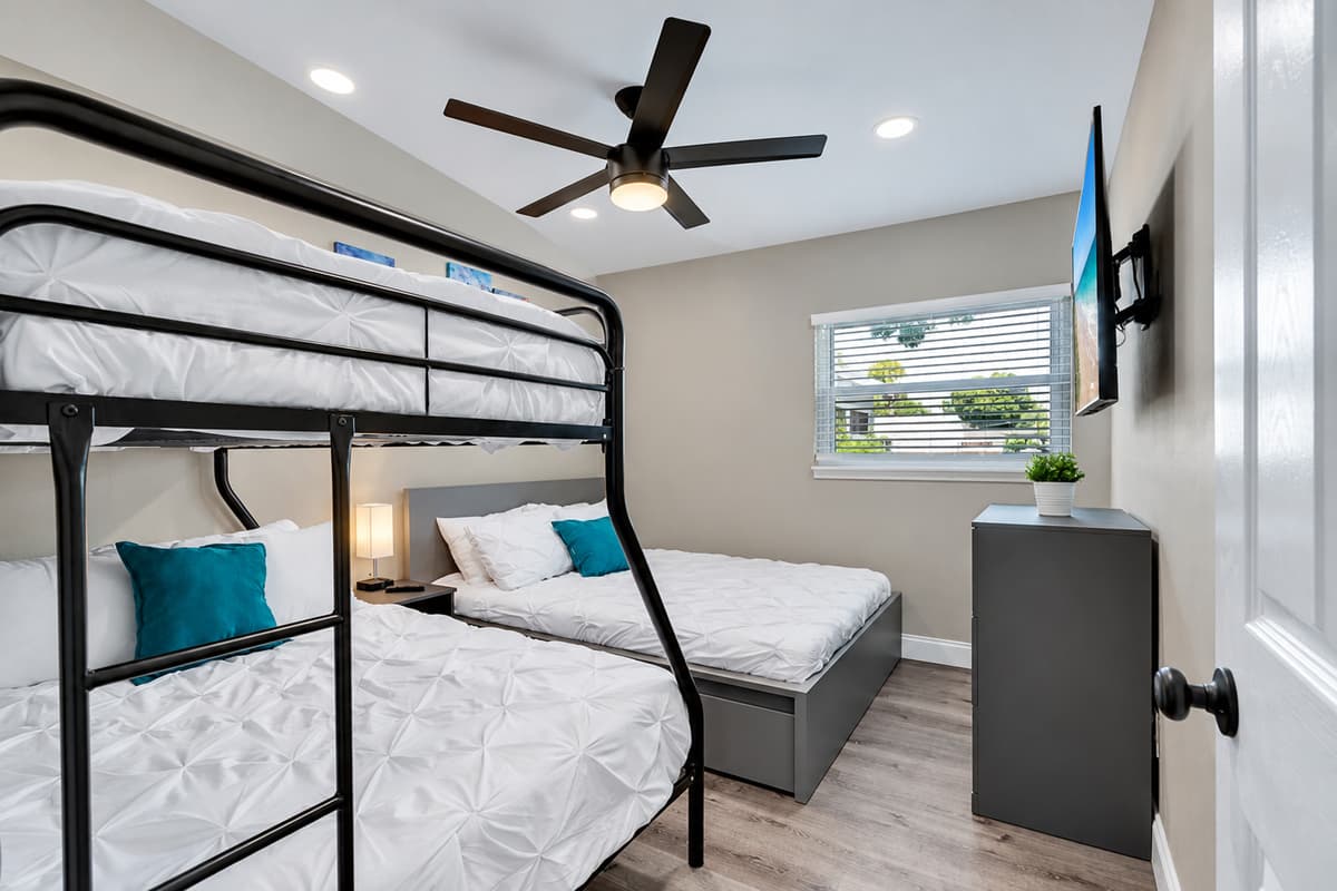 This bedroom is perfect for a small family or a group of friends who wants to hang out and sleep in one room. It is very spacious and has drawers for storage. If you are interested to book this house, Send us a message now!