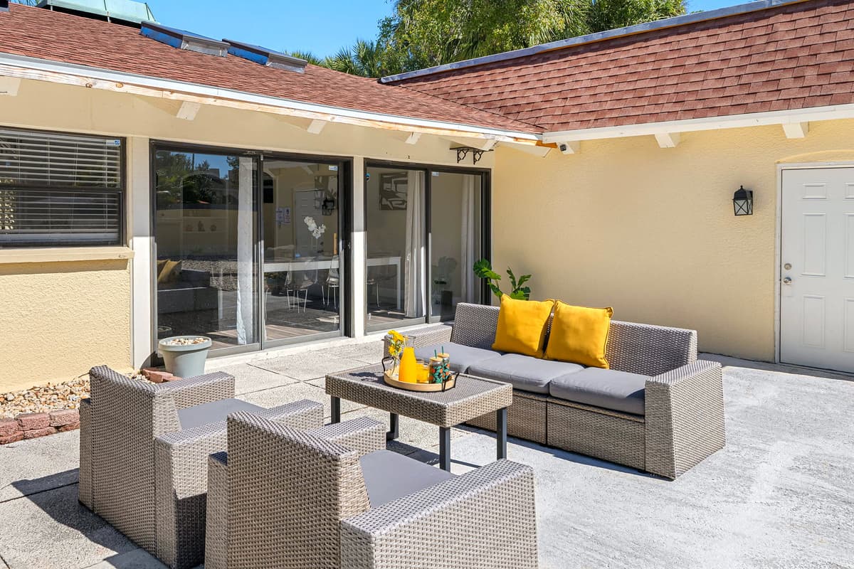 Sleek furniture, a sparkling pool, and open skies — this modern patio invites you to relax in style from sunrise to sunset.