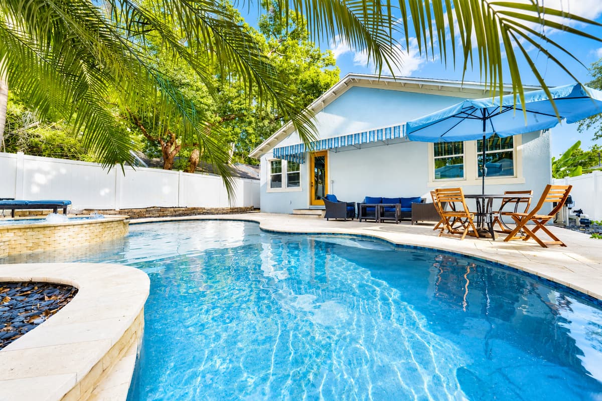 Whether you're swimming, sunbathing, or dining outdoors, this private backyard offers the perfect setting for your vacation.