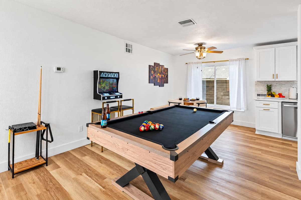 Your vacation just leveled up—this stylish game room is stocked with entertainment and ready for unforgettable memories.