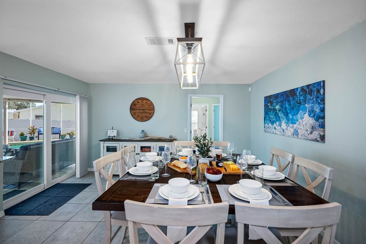 This elegant dining space comfortably seats up to eight guests, perfect for shared meals and memorable moments.